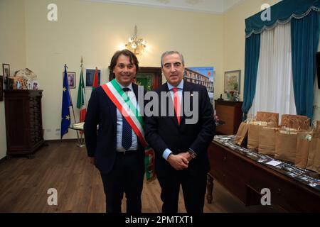 Pagani, Salerno, Italy - April 14, 2023 : Seen the Senator, Maurizio Gasparri, to the Municipality of Pagani to attend the opening of the doors of the Sanctuary of the Madonna delle Galline, an ancient feast held on Sunday after Easter. To welcome him in Pagani on April 14, 2023, the Mayor of the city, Lawyer Raffaele Maria De Prisco. In memory of the feast was offered to the Vice President of the Senate, Maurizio Gasparri, a small statue depicting the image of the Madonna delle Galline, created by the pagan artist, Maestro Alfonso Pepe.In the photo Maurizio Gasparri (right) and the Mayo Stock Photo