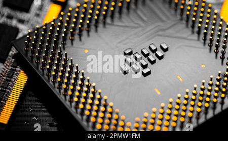 A close-up shot of an electronic circuit board with many electronic components Stock Photo