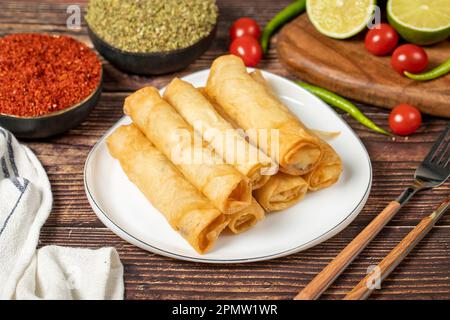 cheese cigarette Turkish Sigara Brek Recipe: Crispy Rolls Swiss Cheese with a Lit