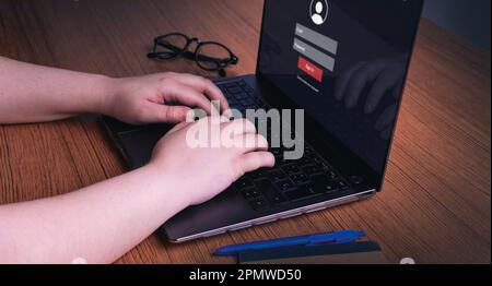 Woman using laptop to log in her personal user. Security information and encryption. Cybersecurity concept. Secure internet access. Stock Photo