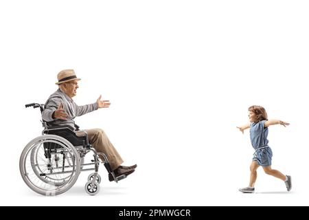 Little girl running to hug an elderly man in a wheelchair isolated on white background Stock Photo