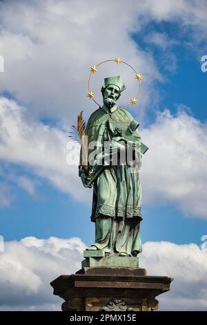 Statue of St. John of Nepomuk on Charles bridge, Prague. Czech Republic. Stock Photo