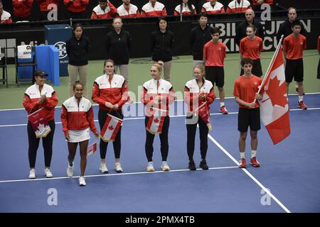 Vancouver, Canada. 14th Apr, 2023. Team Canada stands for the National Anthem prior to the start of the first match at the meeting between Canada and Belgium, in the qualifiers for the Billie Jean King Cup tennis in Vancouver, Canada, on Friday 14 April 2023. BELGA PHOTO ANNE-MARIE SORVIN Credit: Belga News Agency/Alamy Live News Stock Photo