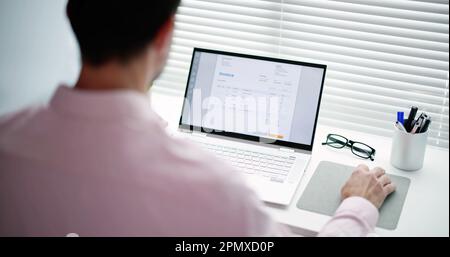 E Invoice Business Management. Accountant Using Electronic Invoice Stock Photo