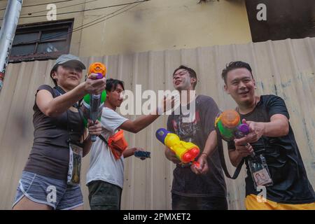 Bangkok, Thailand. 15th Apr, 2023. Tourists seen shooting water guns at Khaosan road in Bangkok. Songkran 2023 festival is the first Songkran festival after COVID restrictions in Thailand. This festival is the Thai New Year's national holiday that takes place on 13-15 April. Songkran festival famous activity is the public water fights framed as ritual cleansing. Credit: SOPA Images Limited/Alamy Live News Stock Photo