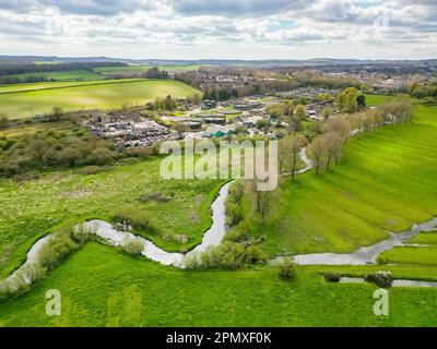 Dorchester, Dorset, UK.  15th April 2023.  View from the air of the Louds Mill sewage treatment works at Dorchester in Dorset owned by Wessex Water.   In 2022, the sewer storm overflow (Permit number: 401050) spilled 48 times for a total of 283.85 hours, discharging into the River Frome, which is a couple of hundred meters away from the sewage works.  (Source: https://theriverstrust.org/key-issues/sewage-in-rivers) Picture Credit: Graham Hunt/Alamy Live News Stock Photo