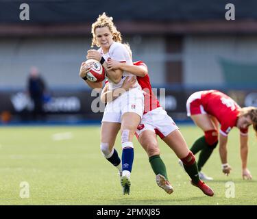 Cardiff, UK. 15th Apr, 2023. Ellie Kildunne of England Women is tackled during the TikTok Women's Six Nations match Wales vs England at BT Cardiff Arms Park, Cardiff, United Kingdom, 15th April 2023 (Photo by Nick Browning/News Images) in Cardiff, United Kingdom on 4/15/2023. (Photo by Nick Browning/News Images/Sipa USA) Credit: Sipa USA/Alamy Live News Stock Photo