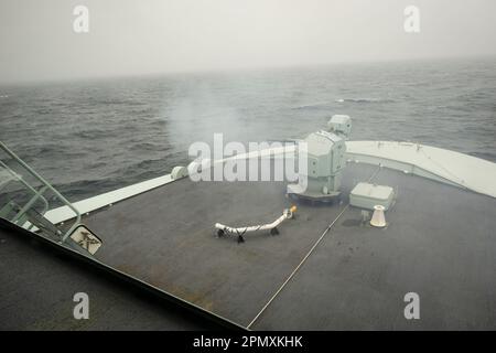 Target practice using the 25mm gun on the bow of the Royal Canadian Navy's HMCS Margaret Brooke during Operation Nanook 2022. Stock Photo