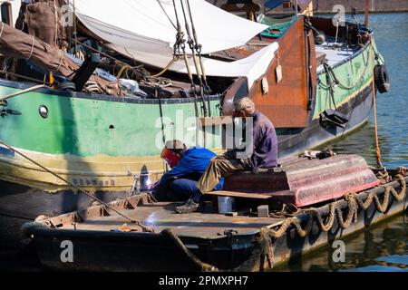 Amsterdam, Netherlands - 6 September 2022: Welder man working on a ship hull Stock Photo
