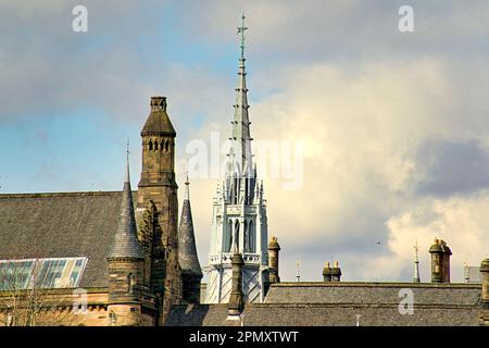 university of glasgow rooftops with The white spire on the Memorial Chapel Stock Photo