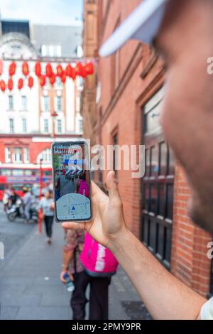 London, UK - july 31 2022 Smartphone showing navigation turn-by-turn trough the streets of London Stock Photo