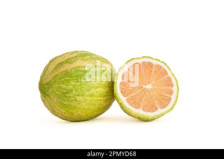 Close-up of pink lemons with stripes on a white background Stock Photo