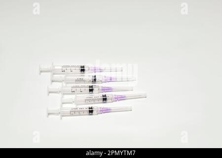 Medical disposable syringe with needle. Applicable for vaccine injection Stock Photo