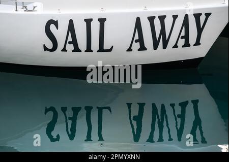 Limassol, Cyprus - March 23, 2023 - Printed letters of a ship called Sail Away at the old harbour Stock Photo