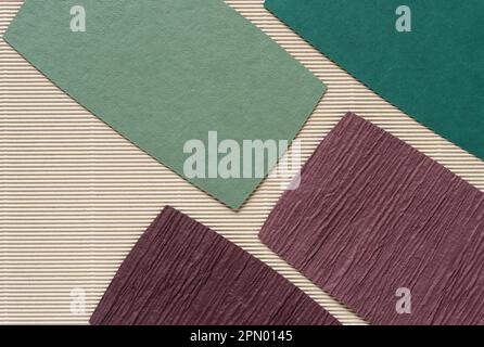 various paper cards with texture on beige corrugated cardboard paper Stock Photo