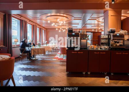 Couple having breakfast in luxurious restaurant at hotel Stock Photo