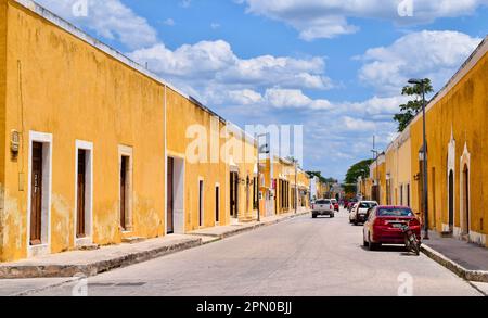 A beautiful street in the yellow city of Izamal, Yucatan, Mexico. Stock Photo