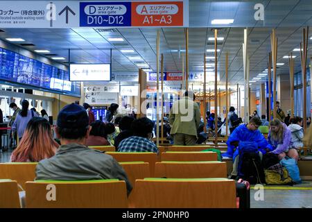 April 15, 2023, Tokyo, Japan: People are seen waiting for high-speed and long-distance buses at Busta Shinjuku, located in Shinjuku Ward. Busta Shinjuku is a high-speed bus terminal located in Shinjuku, Tokyo. It serves as a hub for various bus companies that provide transportation to different parts of Tokyo, Kanto region, Chubu region, Hokuriku region, Hokkaido, Tohoku region, and even some international destinations. As for the facilities, there are multiple bus bays, waiting rooms, automatic ticket machines, restaurants, convenience stores, toilets, shower rooms, luggage storage, ATMs, and Stock Photo