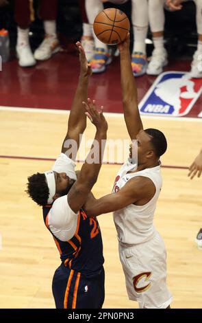 Cleveland, USA. 15th Apr, 2023. Cleveland Cavaliers Evan Mobley (4) shoots over New York Knicks Mitchell Robinson (23) in the first half at Rocket Mortgage FieldHouse in Cleveland, Ohio on Saturday, April 15, 2023. Photo by Aaron Josefczyk/UPI Credit: UPI/Alamy Live News Stock Photo