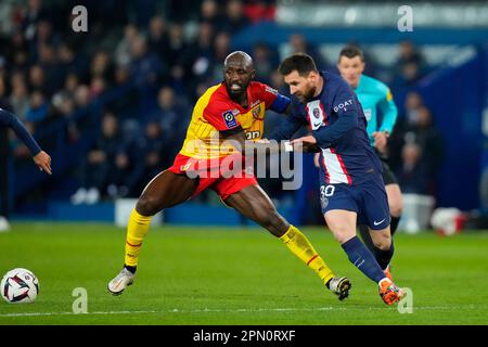 Paris, France. 15th Apr, 2023. Paris Saint Germain's Lionel Messi (R) breaks through during a French Ligue 1 football match between Paris Saint Germain (PSG) and RC Lens in Paris, France, April 15, 2023. Credit: Glenn Gervot/Xinhua/Alamy Live News Stock Photo