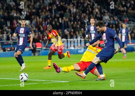 Paris, France. 15th Apr, 2023. Paris Saint Germain's Lionel Messi (1st R) shoots during a French Ligue 1 football match between Paris Saint Germain (PSG) and RC Lens in Paris, France, April 15, 2023. Credit: Glenn Gervot/Xinhua/Alamy Live News Stock Photo