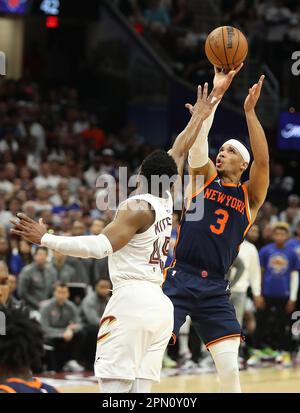 Cleveland, USA. 15th Apr, 2023. New York Knicks Josh Hart (3) shoots over Cleveland Cavaliers Donovan Mitchell (45) in the second half at Rocket Mortgage FieldHouse in Cleveland, Ohio on Saturday, April 15, 2023. Photo by Aaron Josefczyk/UPI Credit: UPI/Alamy Live News Stock Photo