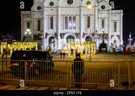 Moscow, Russia. 15th Apr, 2023. Police fence off the Cathedral of Christ the Savior from the crowd in Moscow. Orthodox Easter is celebrated on the night of April 16. A closed church service is being conducted on that night at the Cathedral of Christ the Savior in Moscow. Putin's press secretary announces that the Russian President will attend the ceremony in the cathedral. On the night of April 16, the ceremony was an invitation-only event. (Photo by Vlad Karkov/SOPA Images/Sipa USA) Credit: Sipa USA/Alamy Live News Stock Photo