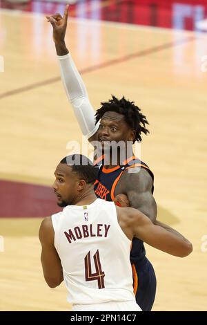 Cleveland, USA. 15th Apr, 2023. New York Knicks Julius Randle (30) looks for a pass over Cleveland Cavaliers Evan Mobley (4) in the second half at Rocket Mortgage FieldHouse in Cleveland, Ohio on Saturday, April 15, 2023. Photo by Aaron Josefczyk/UPI Credit: UPI/Alamy Live News Stock Photo