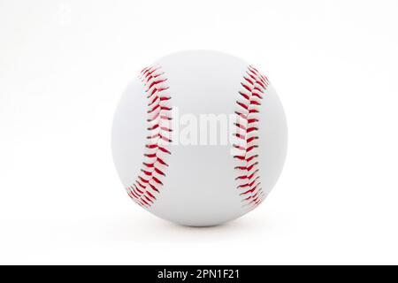Close-up of a white baseball with red stitching on a white background Stock Photo