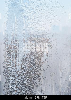 frozen home window pane on cold winter day Stock Photo