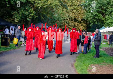 Belfast County Down Northern Ireland September 24 2022 - Members of the Red Rebel Brigade appear at a climate change  event in Ormeau Park Belfast Stock Photo