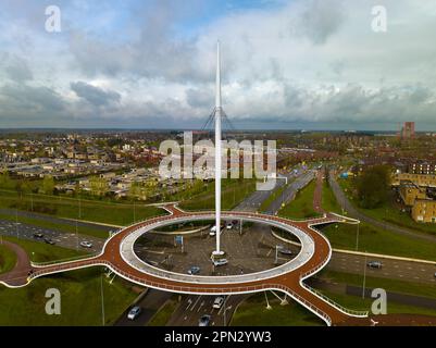 The hovenring is a unique architect in Eindhoven Netherlands. This is a roudobout path for cyclers. This ringroad is linking Endhoven with Veldhoven a Stock Photo