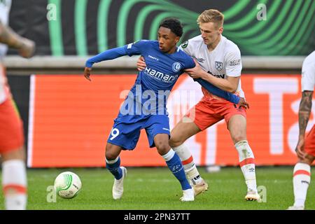 Malick Fofana of Gent and Flynn Downes of West Ham pictured during a soccer game between AA Gent and West Ham United during the first leeg of the quarter final in the Uefa Conference League for the 2022-2023 season ,  on  Sunday 13 April 2023  in Gent , Belgium . PHOTO SPORTPIX | Dirk Vuylsteke Stock Photo