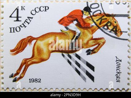 ISTANBUL, TURKEY - JANUARY 03, 2021: Soviet Union stamp shows Equestrian Sports, Hurdles circa 1982 Stock Photo