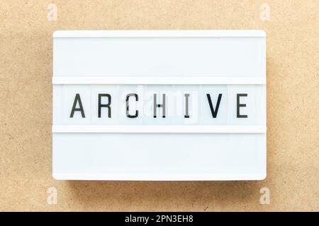 Lightbox with word archive on wood background Stock Photo