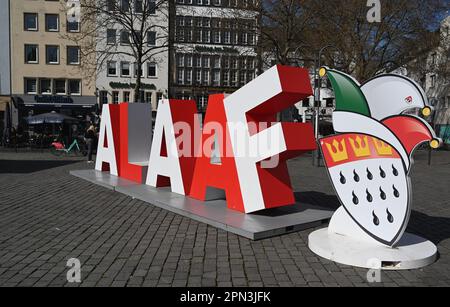 Cologne, Germany. 09th Apr, 2023. The two-meter high Alaaf lettering stands as a selfie hotspot in front of Cologne's Old Town on Heumarkt as a gift from the Cologne Carnival Festival Committee for the 200th anniversary of Carnival. Alaaf is world-famous as a traditional Cologne exclamation and a real trademark of Rhenish joie de vivre. Credit: Horst Galuschka/dpa/Alamy Live News Stock Photo
