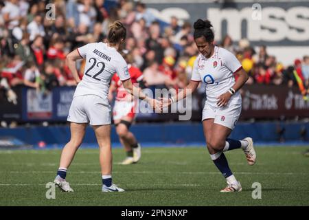 Cardiff, Wales. 15th April 2023. Lagi Tuima and   Sarah McKenna during the TikTok Women’s Six Nations rugby match, Wales versus England at Cardiff Park Arms Stadium in Cardiff, Wales. Credit: Sam Hardwick/Alamy Live News. Stock Photo