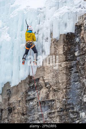 Freja Shannon climbing a mixed route in Haffner Creek area in British Columbia Canada Stock Photo