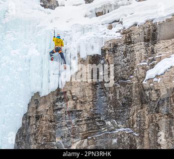 Freja Shannon climbing a mixed route in Haffner Creek area in British Columbia Canada Stock Photo