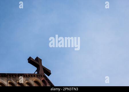 Freiburg Im Breisgau, Germany. 13th Apr, 2023. A cross is seen on the facade of Freiburg Cathedral. On April 18, the Archdiocese of Freiburg will hold a press conference on the final report of the independent working group file analysis on the reappraisal of the former handling of sexualized violence. The report on the earlier handling of sexualized violence in the Archdiocese of Freiburg was prepared by independent experts. Credit: Philipp von Ditfurth/dpa/Alamy Live News Stock Photo