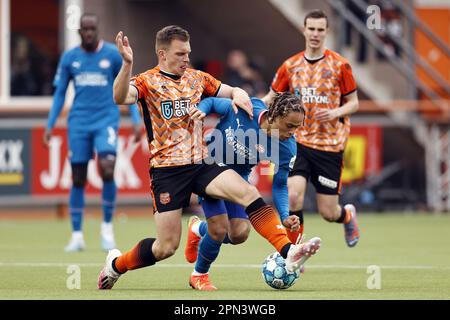 VOLENDAM - (lr) Damon Mirani of FC Volendam, Xavi Simons of PSV Eindhoven during the Dutch premier league match between FC Volendam and PSV Eindhoven at Kras stadium on April 16, 2023 in Volendam, Netherlands. ANP MAURICE VAN STONE Stock Photo