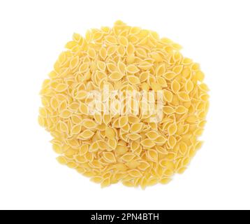Pile of uncooked dry pasta conchiglie isolated on a white. Top view. Stock Photo