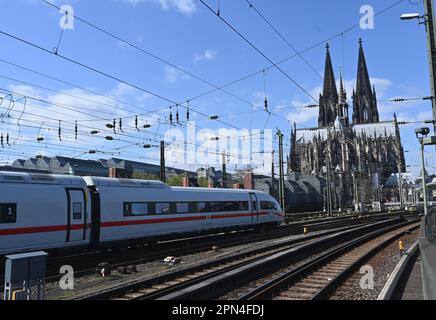 Cologne, Germany. 09th Apr, 2023. The entrance to Cologne main station with an ICE on the tracks and the Cologne Cathedral. Credit: Horst Galuschka/dpa/Alamy Live News Stock Photo