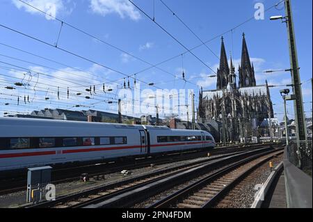 Cologne, Germany. 09th Apr, 2023. The entrance to Cologne main station with an ICE on the tracks and the Cologne Cathedral. Credit: Horst Galuschka/dpa/Alamy Live News Stock Photo