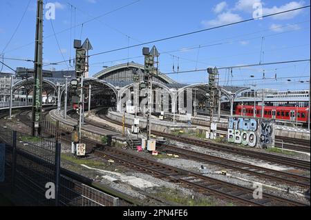 Cologne, Germany. 09th Apr, 2023. The entrance to Cologne main station with an ICE and S-Bahn on the tracks. Credit: Horst Galuschka/dpa/Alamy Live News Stock Photo