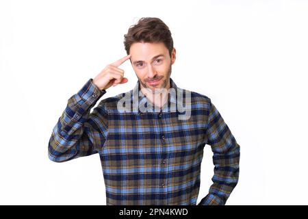 Adult hipster male model posing in a plait shirt with a crazy expression Stock Photo