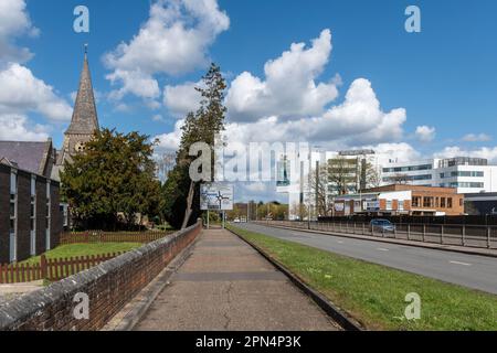 Street view along Church Road A3095 towards the Met Office Roundabout and Bracknell & Wokingham College building, Bracknell, Berkshire, England, UK Stock Photo