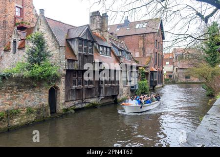 Canal boat on the Groenerei (canal), Bruges (Brugge), Brugge (Bruges), West Flanders Province, Flemish Region, Belgium Stock Photo