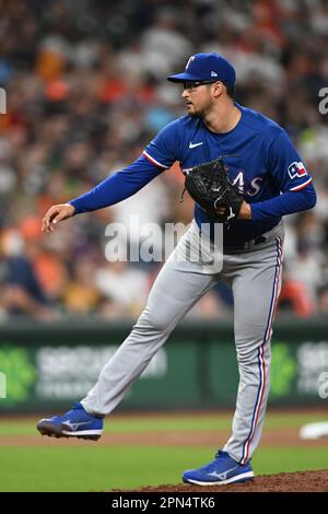 Texas Rangers starting pitcher Dane Dunning delivers during the first ...