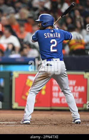 Texas Rangers second baseman Marcus Semien warms up during the first ...